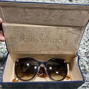 Authentic Louis Vuitton women's sunglasses.Worn twice excellent cond bx included